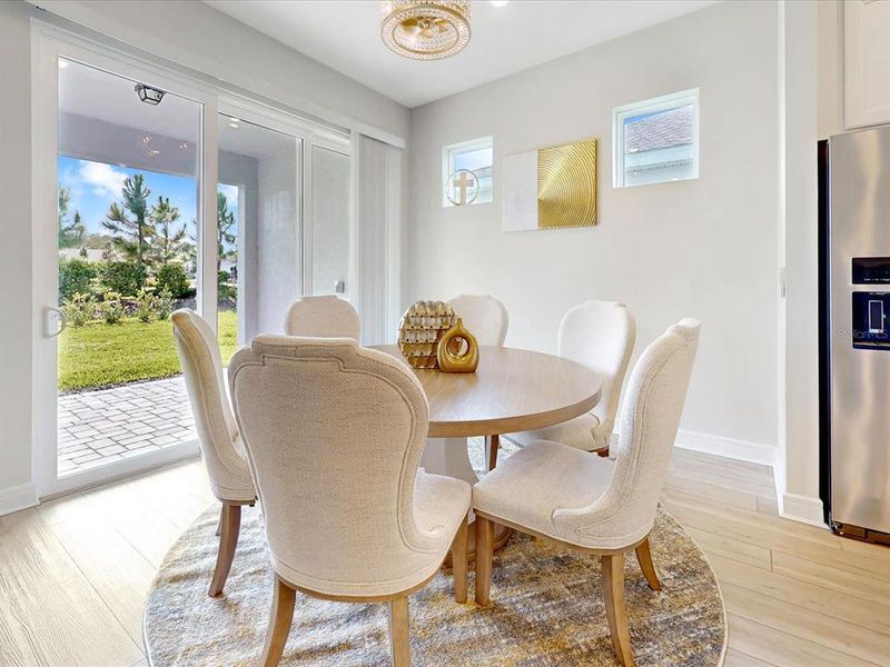 Furnished interior view inside a new home in Del Webb Sunbridge, St. Cloud (Image 7).