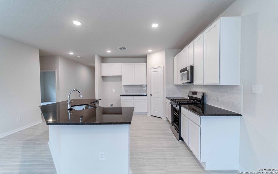 Furnished interior view inside a new home in Hickory Ridge, Elmendorf (Image 6).