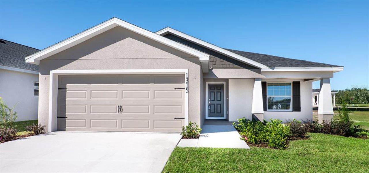 Front exterior of a new home in Lakeside Preserve, Lakeland, FL, highlighting curb appeal (Image 1).