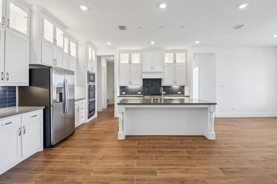 Furnished interior view inside a new home in Gean Estates, Keller (Image 5).