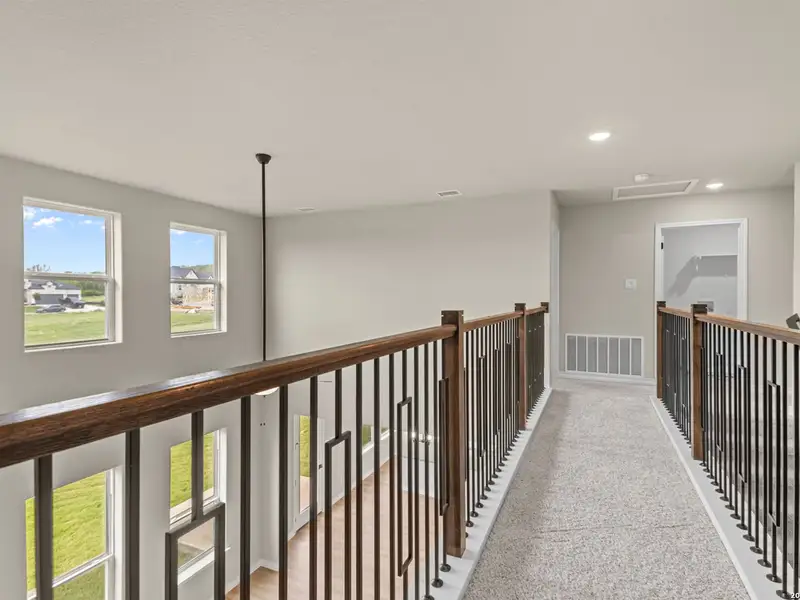 Spacious, unfurnished interior of a new home in The Reserve at Potranco Oaks, Castroville (Image 36).