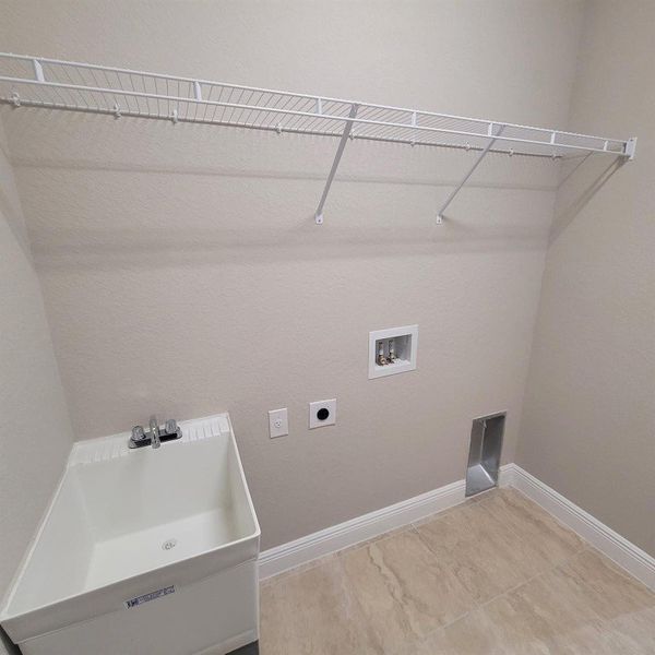 Laundry room with sink