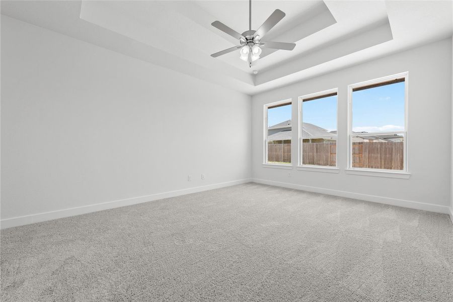 Spacious, unfurnished interior of a new home in Sunterra, Katy (Image 10).