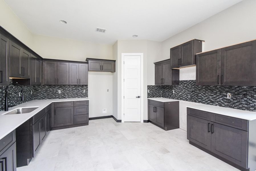 Kitchen and Breakfast area is huge! Lots of Cabinets and Counterspace and open area. Kitchen and Breakfast area is huge! Lots of Cabinets and Counterspace and open area.