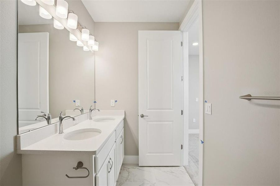 Furnished interior view inside a new home in Lagoon Residences at Epperson, Wesley Chapel (Image 30).