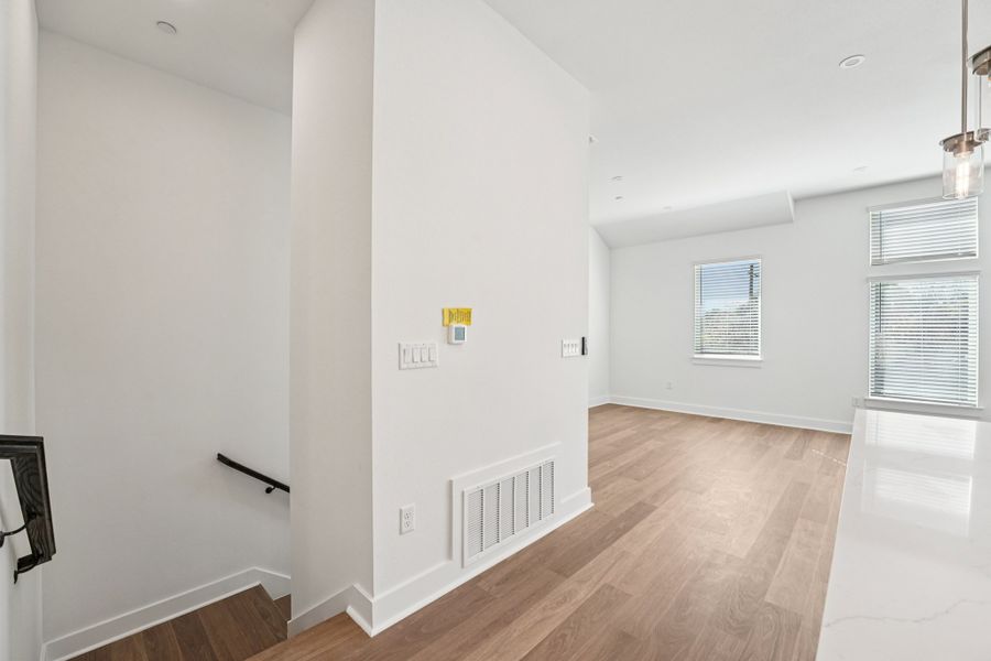Spacious, unfurnished interior of a new home in Koenig Townhomes, Austin (Image 13).