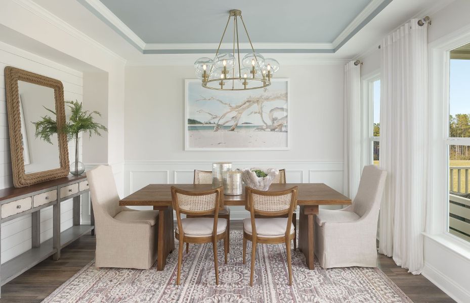 Enhance your dining experience with an optional tray ceiling in the dining room to complement the elegant flooring. Enhance your dining experience with an optional tray ceiling in the dining room to complement the elegant flooring.