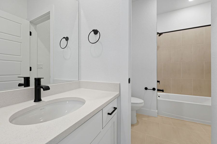 Furnished interior view inside a new home in Trailstone, Arvada (Image 8).