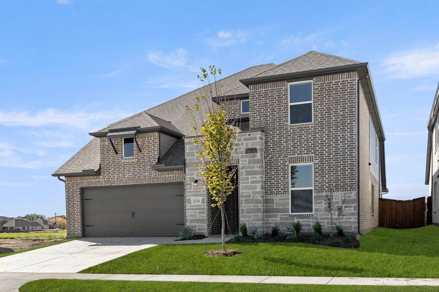 Representative exterior photo of a completed home built from the Hero by Rockwell Homes in Creekside, Royse City, TX (Image 32). Representative exterior photo of a completed home built from the Hero by Rockwell Homes in Creekside, Royse City, TX (Image 32).