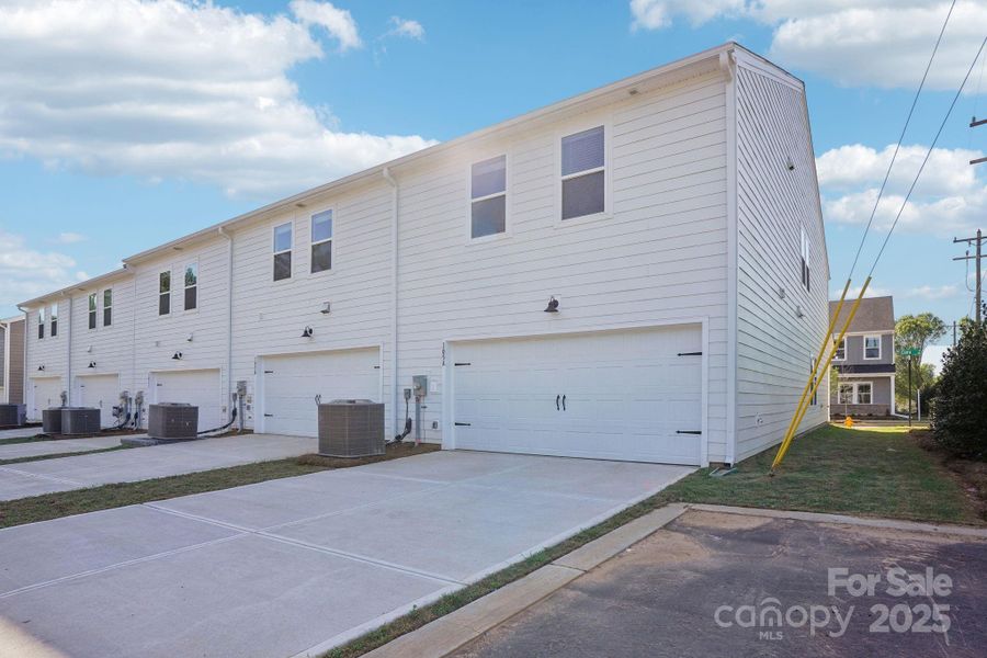 Front exterior of a new home in Crossrail Station, Mooresville, NC, highlighting curb appeal (Image 16).