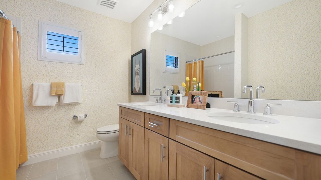 Representative furnished interior of a home built from the Artistry by Neal Communities in Grand Park, Sarasota (Image 14).