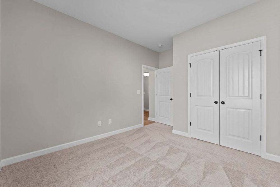 Representative unfurnished interior of a home built from the Weymouth by Caviness & Cates Communities in Bartlett Manor, Youngsville (Image 44).