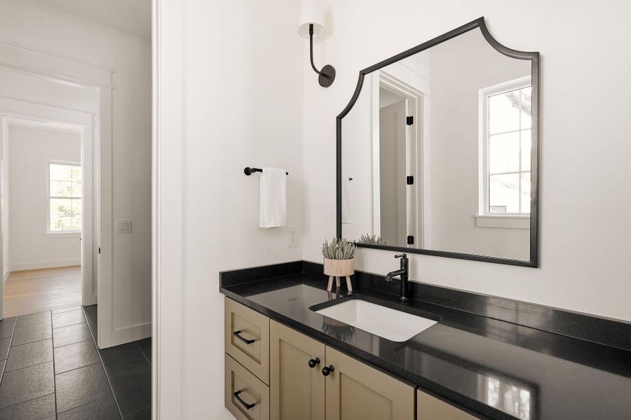 Bathroom featuring vanity and tile patterned flooring Bathroom featuring vanity and tile patterned flooring