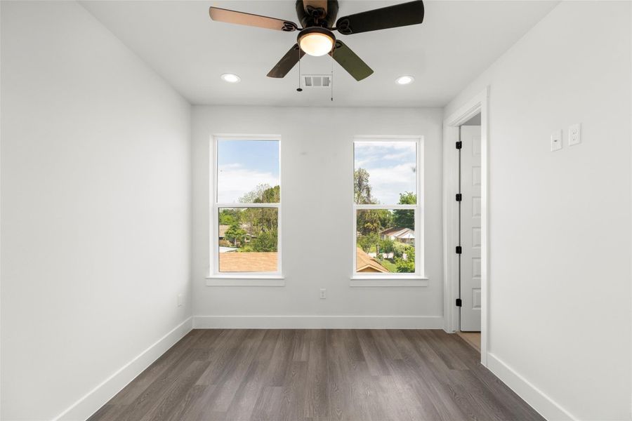 Secondary bedroom with large windows providing plenty of natural light. Secondary bedroom with large windows providing plenty of natural light.