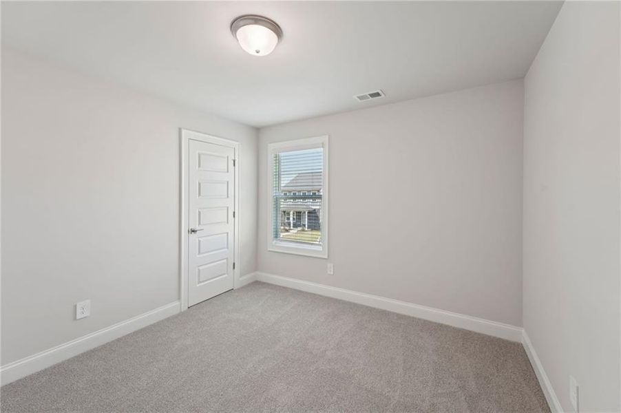 Spacious, unfurnished interior of a new home in Hemingway - Reserve Series, Cumming (Image 43).