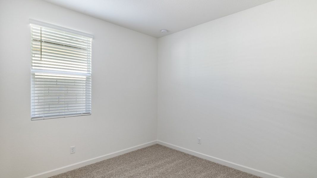 Spacious, unfurnished interior of a new home in Zanjero Pass, Waddell (Image 19).