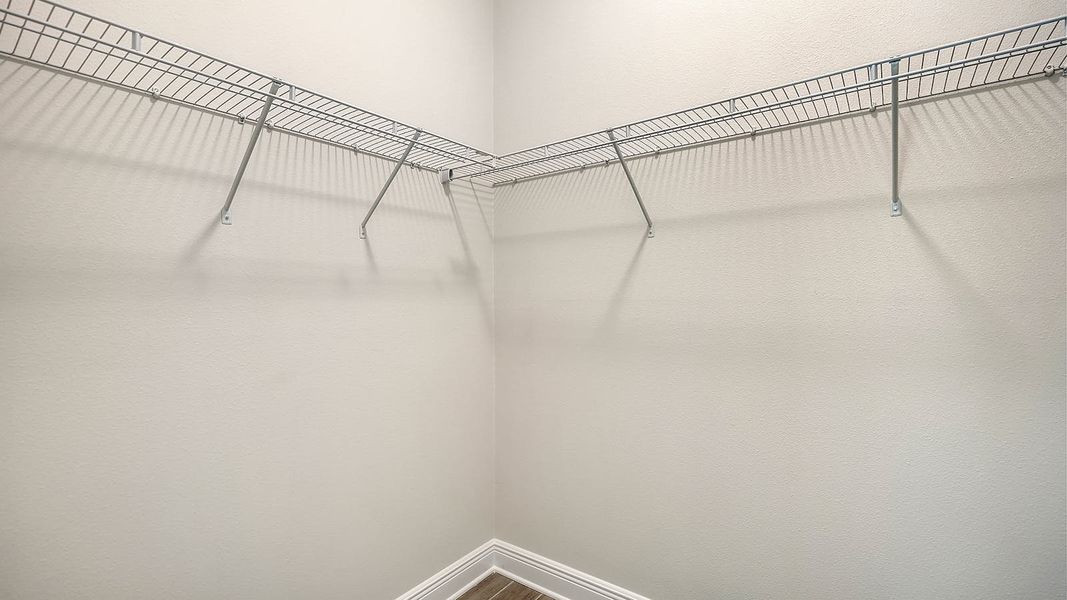 Spacious, unfurnished interior of a new home in Canoe Creek Real Estate and Homes for Sale in Parrish, FL - Neal Communities, Parrish (Image 64).