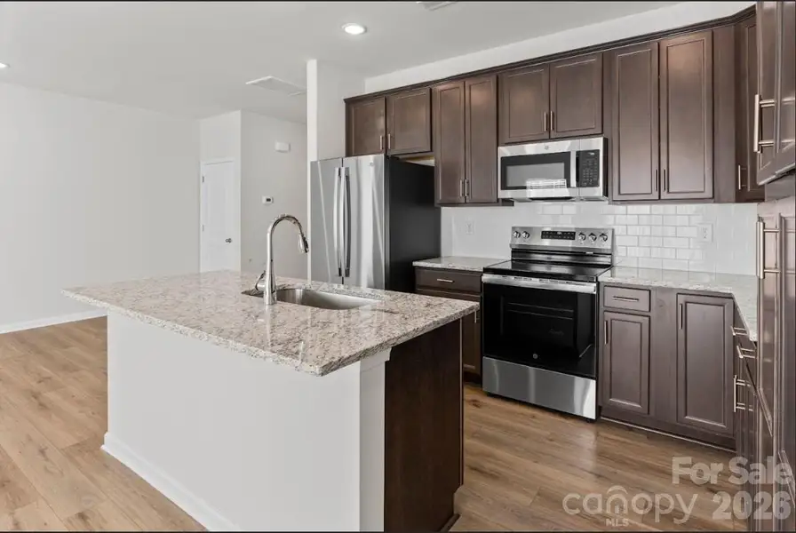 Furnished interior view inside a new home in Sierra Ridge, Gastonia (Image 4).
