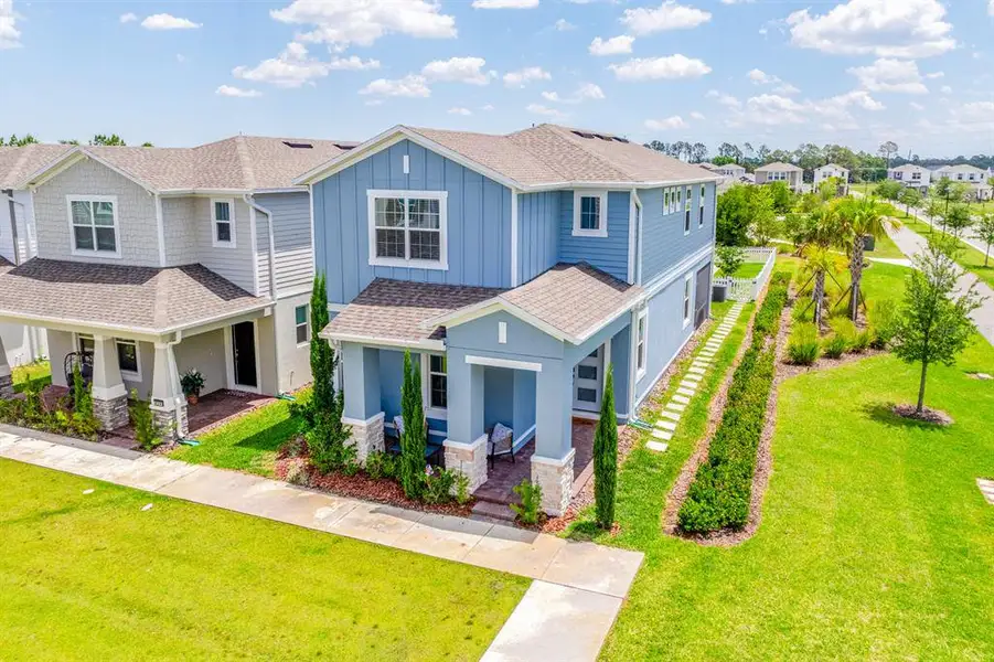 Front exterior of a new home in , Debary, FL, highlighting curb appeal (Image 1). Front exterior of a new home in , Debary, FL, highlighting curb appeal (Image 1).