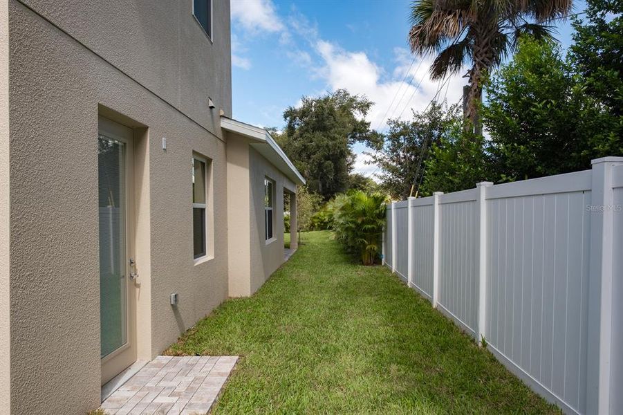 Exterior details and patio area of a home in , Palm Harbor (Image 27).
