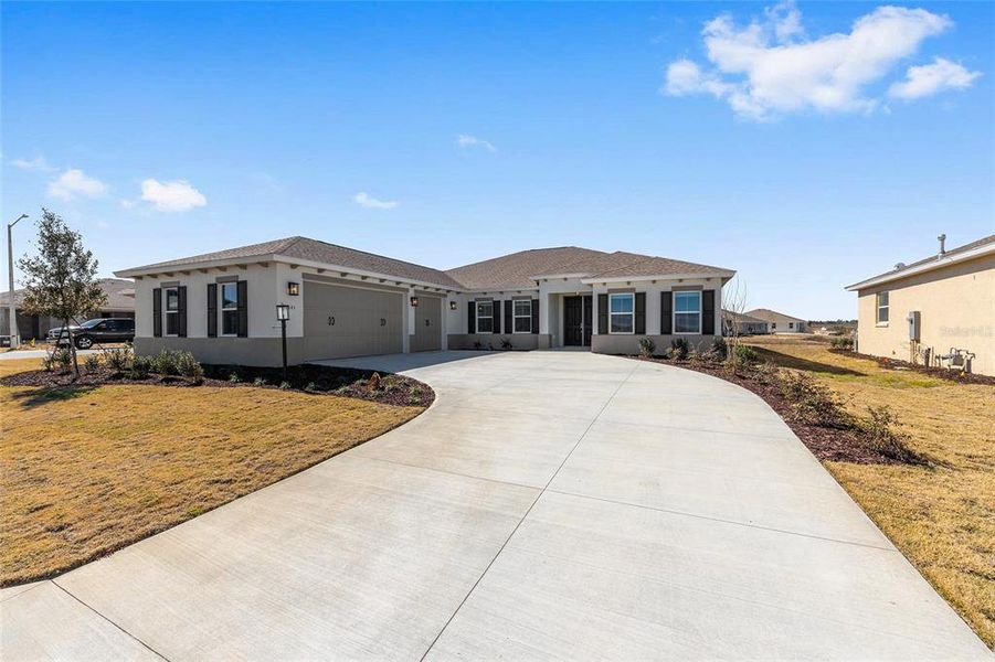 Front exterior of a new home in , Ocala, FL, highlighting curb appeal (Image 20).