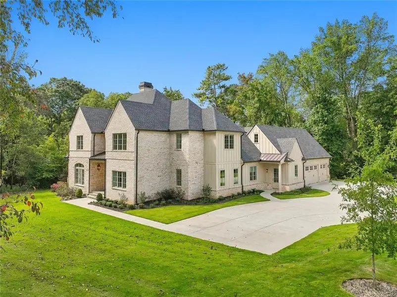 Front exterior of a new home in , Sandy Springs, GA, highlighting curb appeal (Image 2).