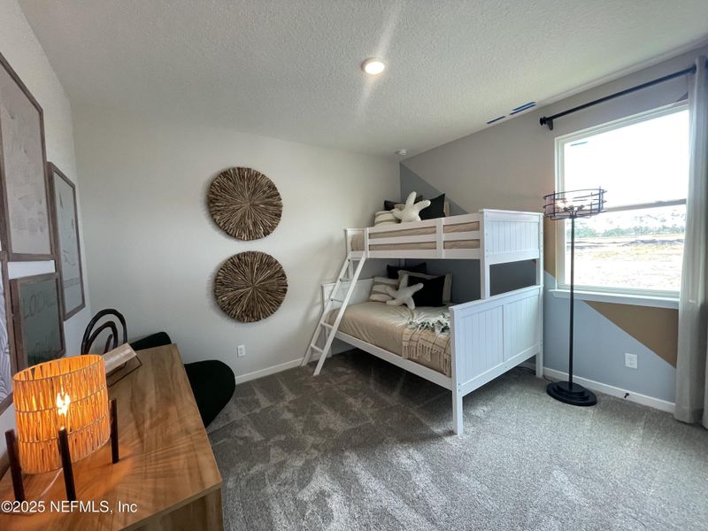 Furnished interior view inside a new home in The Cypress Series at Reserve East, Flagler Beach (Image 14). Furnished interior view inside a new home in The Cypress Series at Reserve East, Flagler Beach (Image 14).