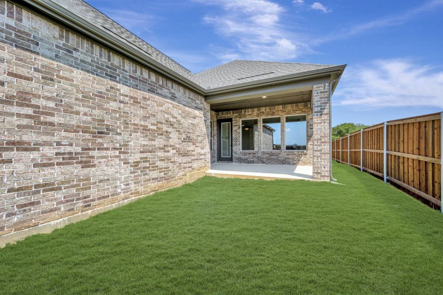 Exterior details and patio area of a home in Elements at Viridian - Signature Series, Arlington (Image 4).
