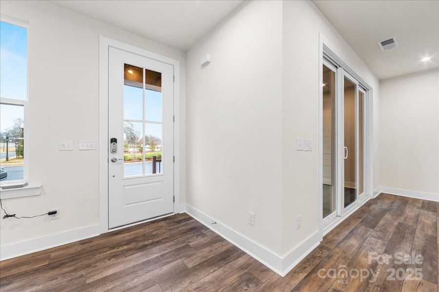 Grand Front Entry Through 8' Doorway.