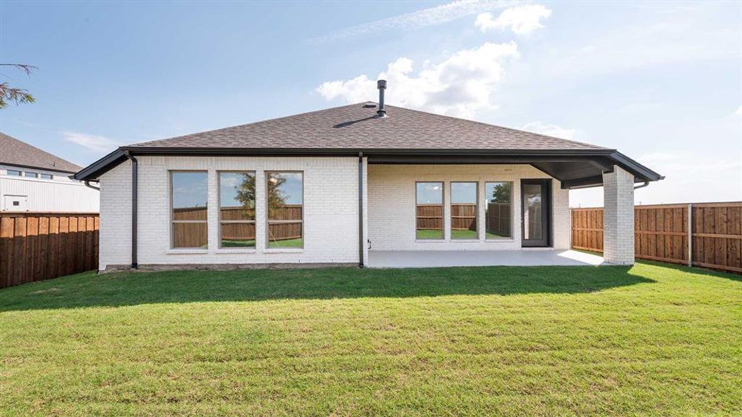 Front exterior of a new home in Trinity Falls 50', McKinney, TX, highlighting curb appeal (Image 18).