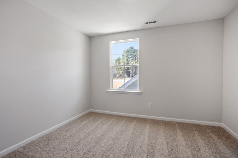 Spacious, unfurnished interior of a new home in Renaissance at White Oak, Garner (Image 29).