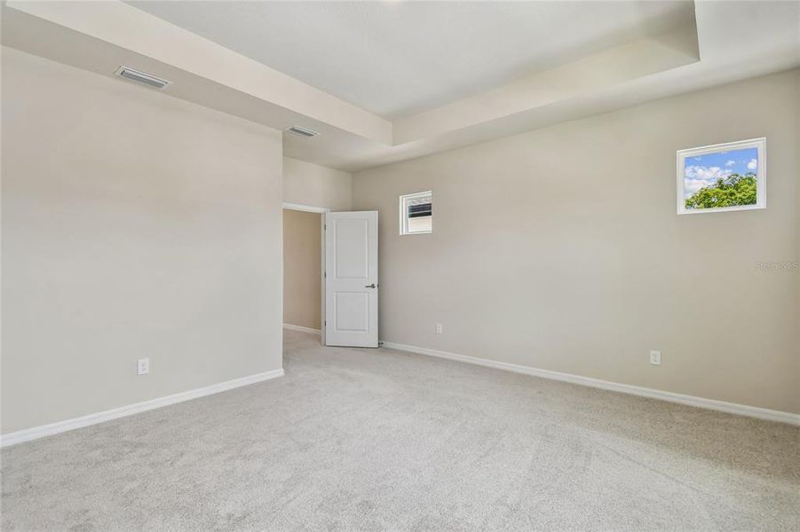 Spacious, unfurnished interior of a new home in Oakfield at Mount Dora Cottage Series, Mount Dora (Image 37).