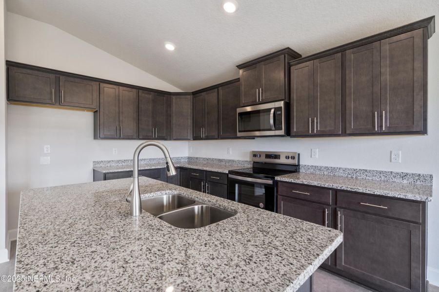 Furnished interior view inside a new home in Shadow Crest at Rolling Hills, Green Cove Springs (Image 8). Furnished interior view inside a new home in Shadow Crest at Rolling Hills, Green Cove Springs (Image 8).
