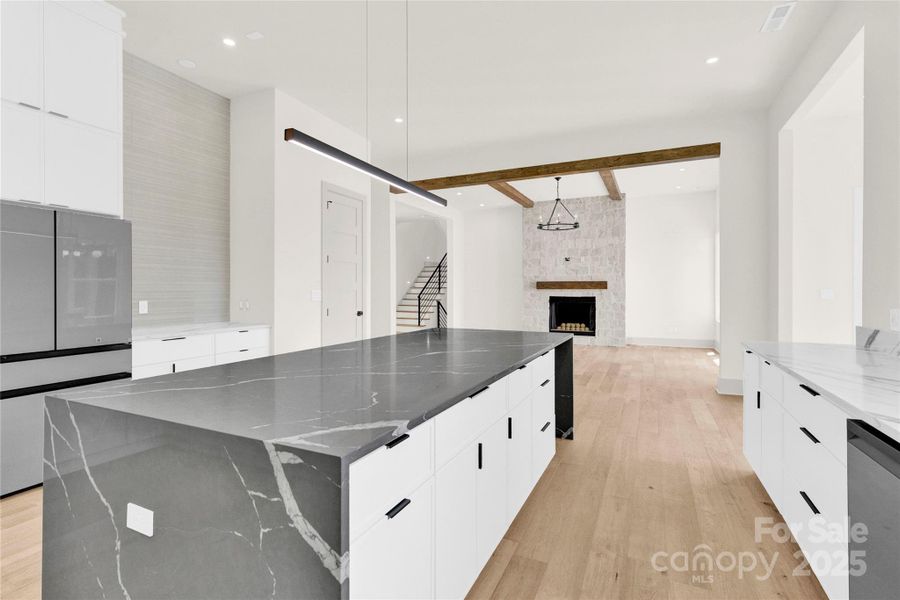 Seamless flow from the kitchen to the great room is perfect for entertaining Seamless flow from the kitchen to the great room is perfect for entertaining