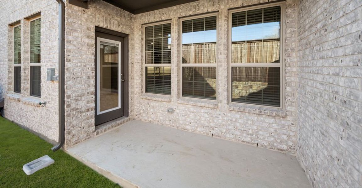Representative exterior photo of a completed home built from the Meredith by Impression Homes in Main Street Village, Mansfield, TX (Image 25). Representative exterior photo of a completed home built from the Meredith by Impression Homes in Main Street Village, Mansfield, TX (Image 25).