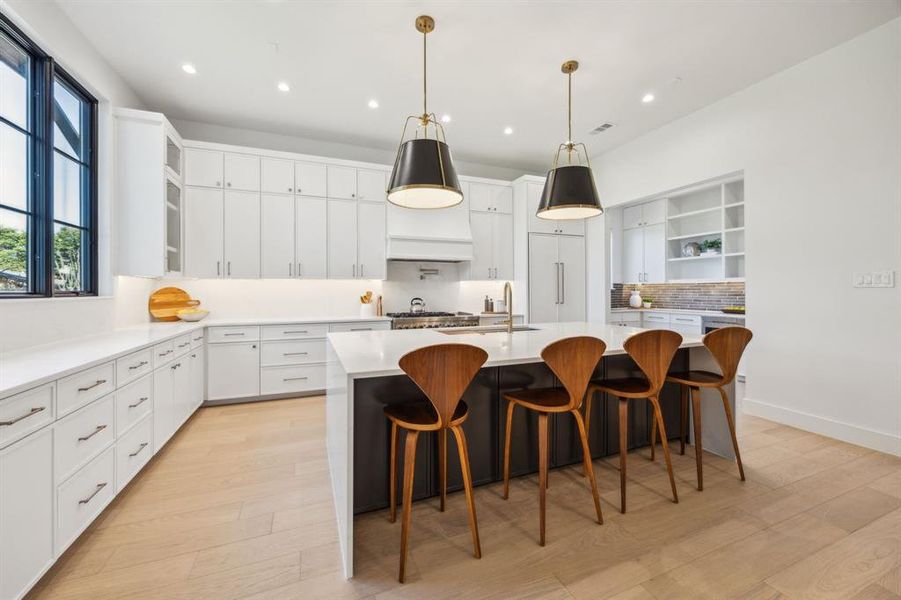 Extra seating in the kitchen with the over sized island. Extra seating in the kitchen with the over sized island.