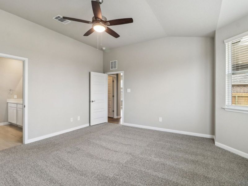 Primary suite in the Medina floorplan at a Meritage Homes community. Primary suite in the Medina floorplan at a Meritage Homes community.