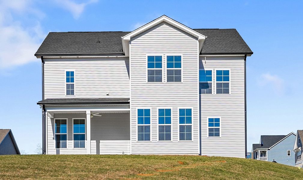 Exterior details and patio area of a home in Hanes Lake, Winston-Salem (Image 3).