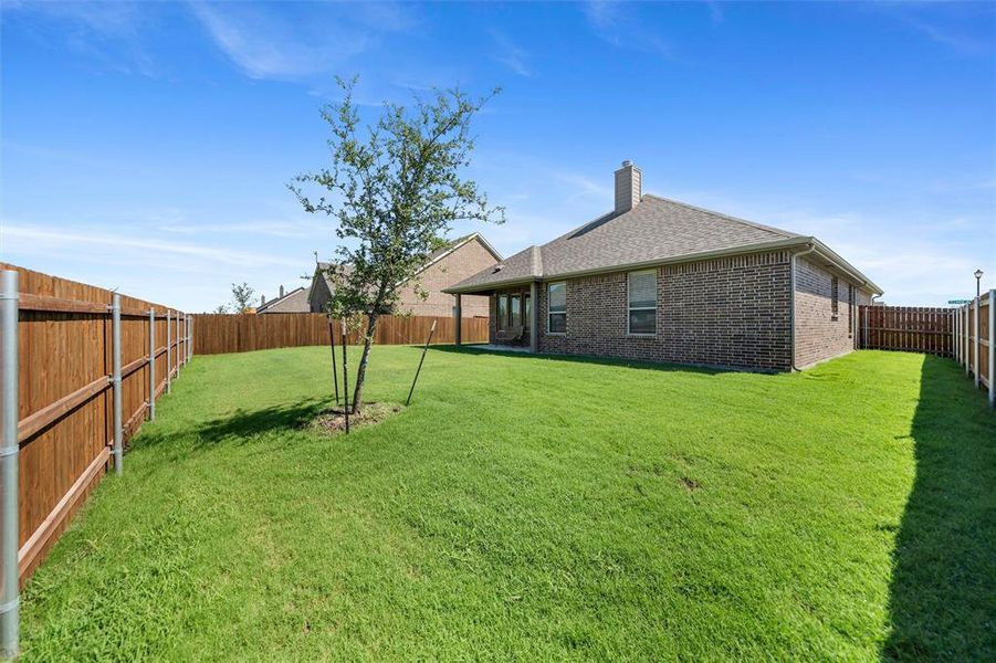 Front exterior of a new home in Aero Vista, Caddo Mills, TX, highlighting curb appeal (Image 24). Front exterior of a new home in Aero Vista, Caddo Mills, TX, highlighting curb appeal (Image 24).