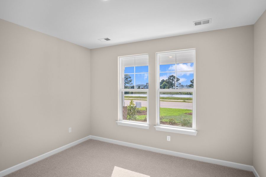 Spacious, unfurnished interior of a new home in Coastal Club of the Carolinas, Calabash (Image 13).