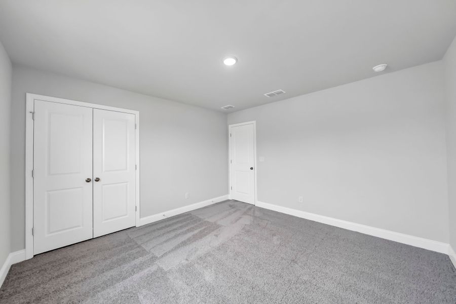 Spacious, unfurnished interior of a new home in Monroe Preserve, Chapin (Image 41).