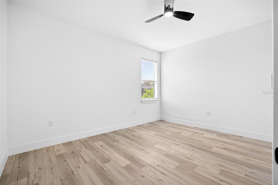 Spacious, unfurnished interior of a new home in , Port Charlotte (Image 36).