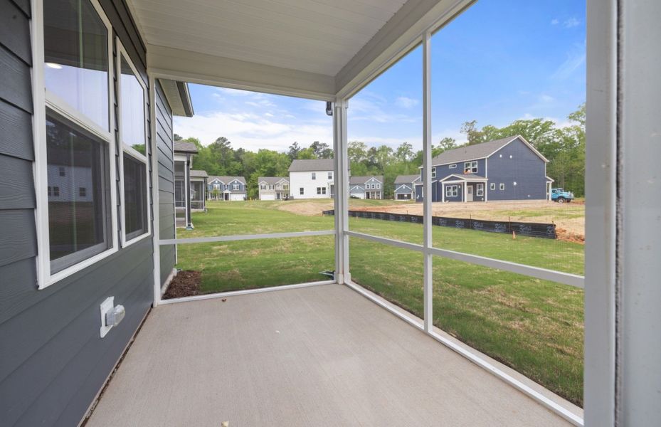 Exterior details and patio area of a home in Exchange at 401, Raleigh (Image 4).