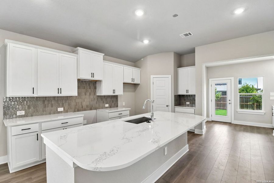 Furnished interior view inside a new home in Estancia Ranch - Premier Series, San Antonio (Image 9).