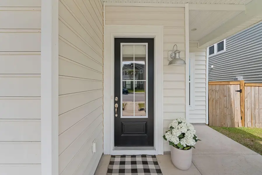 Exterior details and patio area of a home in Heron's Walk at Summers Corner, Summerville (Image 4).
