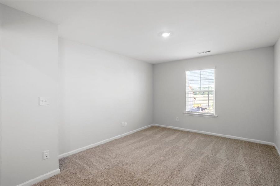 Spacious, unfurnished interior of a new home in Sweetbrier, Durham (Image 30).