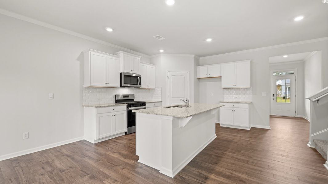 Representative furnished interior of a home built from the Hayden by D.R. Horton in Liberty Crossing, Braselton (Image 7).