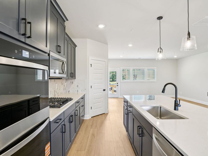Furnished interior view inside a new home in Hemingway - Highland Series, Cumming (Image 6).
