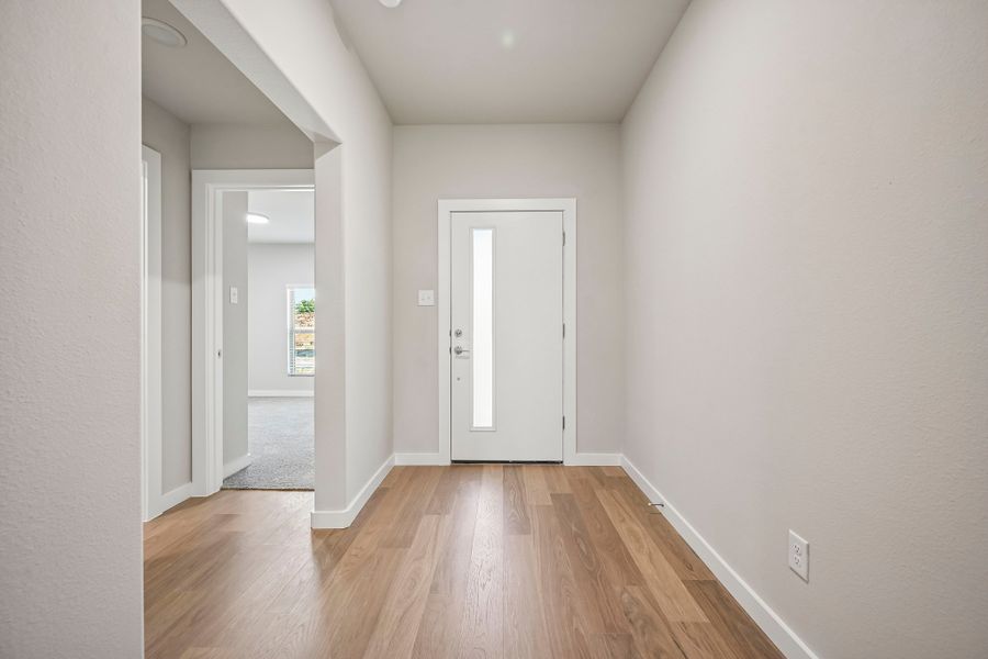 Foyer in the Harrison home plan by Trophy Signature Homes
