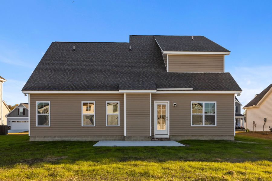 Exterior details and patio area of a home in Arbor Hills South II, Greenville (Image 26).